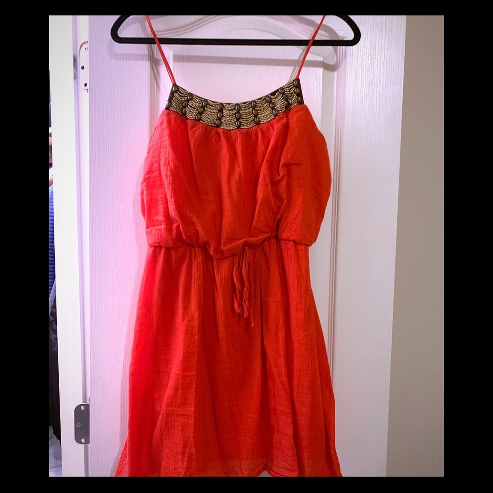 Orange dress with beading detail